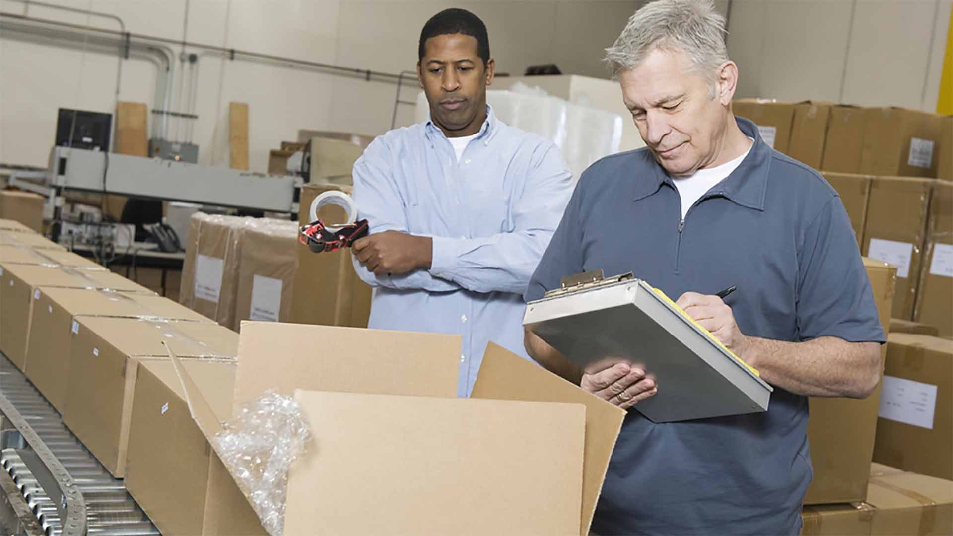 Warehouse-managers-inspecting-a-kitting-process